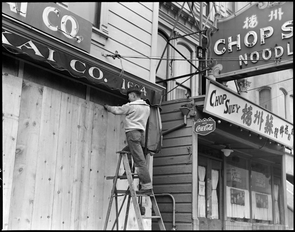 San Francisco, California. With the the owner scheduled to be evacuated, a store front is boarded o . . . - NARA - 536043