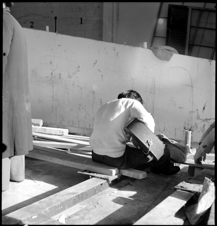 San Francisco, California. Young musician of Japanese ancestry plays his guitar at the Wartime Civi . . . - NARA - 537750