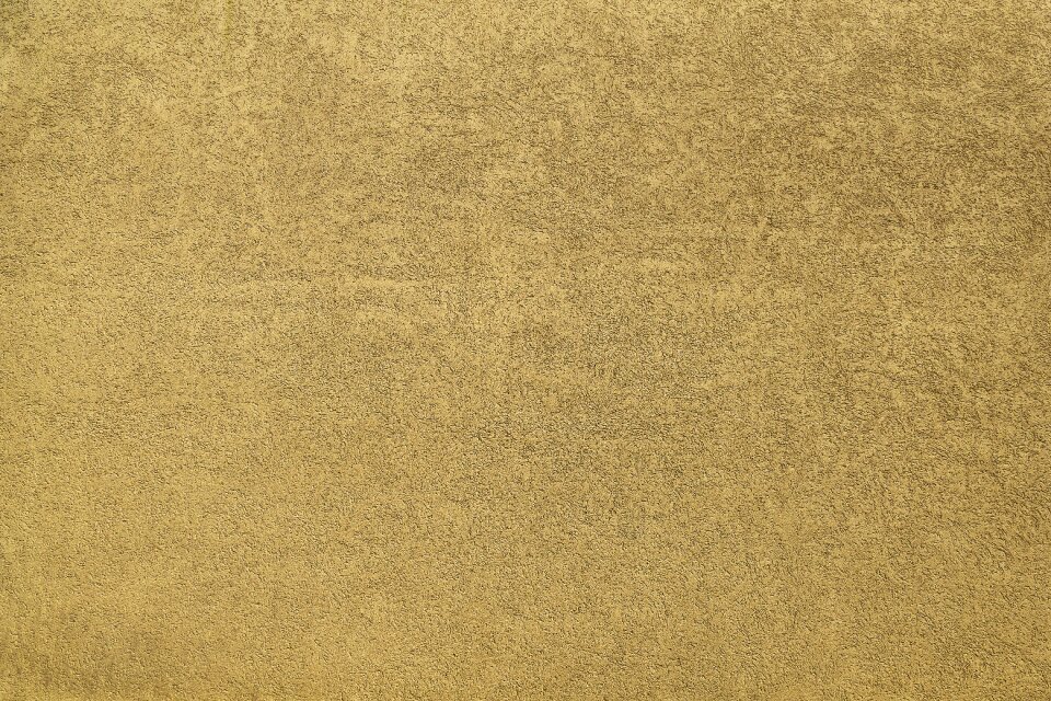 Scratch plaster textured plaster wall