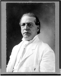 Samuel Gompers, half-length portrait, facing slightly left, wearing white suit LCCN91729473