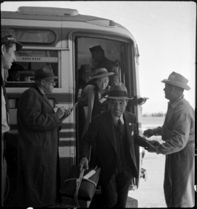 San Bruno, California. Evacuees of Japaneses ancestry arriving at the Tanforan Assembly center. Th . . . - NARA - 537492