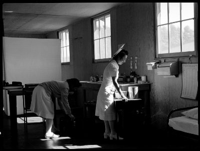 San Bruno, California. Medical clinic at this assembly center. Evacuee nurses of Japanese ancestry . . . - NARA - 537934