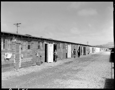 San Bruno, California. Shown here is one type of barracks for family use. These were formerly stal . . . - NARA - 537954 photo