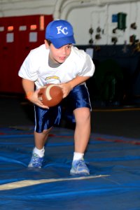 San Diego Chargers visit USS Ronald Reagan 130828-N-UK306-045