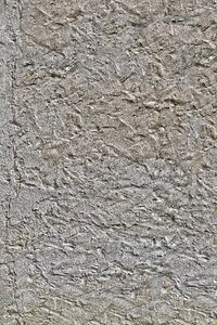 Scratch plaster textured plaster wall