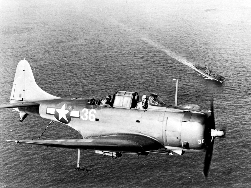 SBD-5 of VB-10 over USS Enterprise (CV-6) 1944