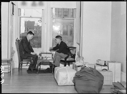 San Francisco, California. Two friends play final game while awaiting evacuation. Evacuees of Japa . . . - NARA - 536404 photo