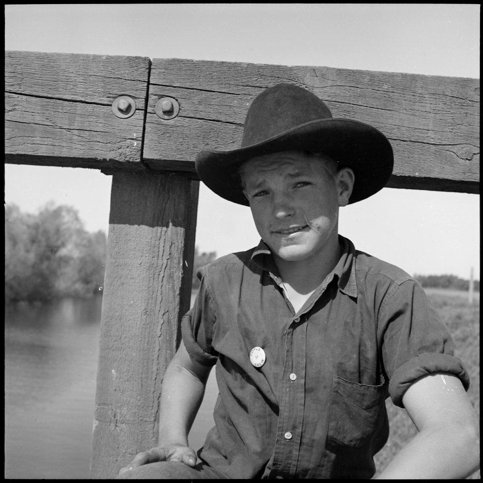 San Joaquin Valley, California. Contract Labor. Sixteen Years Old and the Possessor of a Labor Contractor's Button Entitling Him to Work in the Fields Alongside Adults (3903229791)