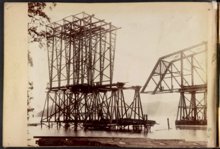 Scaffolding for construction of Hawkesbury River Railway Bridge, New South Wales, Australia, moves away from span atop timber framework on pontoon) - C. Bayliss photo, Sydney LCCN2016651662