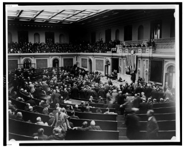 Scene at the opening of the House of Representatives today-Members left their seats to hold an informal reception before the Speaker's desk-Speaker Gillette (sic) is shown in the chair LCCN99471576