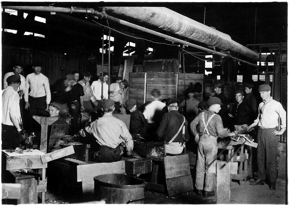 Scene in More-Jonas Glass Co. Small boy in center of photo with cap pulled down over face was undoubtedly under 14... - NARA - 523233