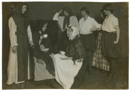 Scenes from 'The Twig of Thorn' given by a club of working girls in King Philip Settlement. Most of them are weavers. All girls. LOC nclc.05082