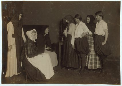 Scenes from 'The Twig of Thorn' given by a club of working girls in King Philip Settlement. Most of them are weavers. All girls. LOC nclc.05088