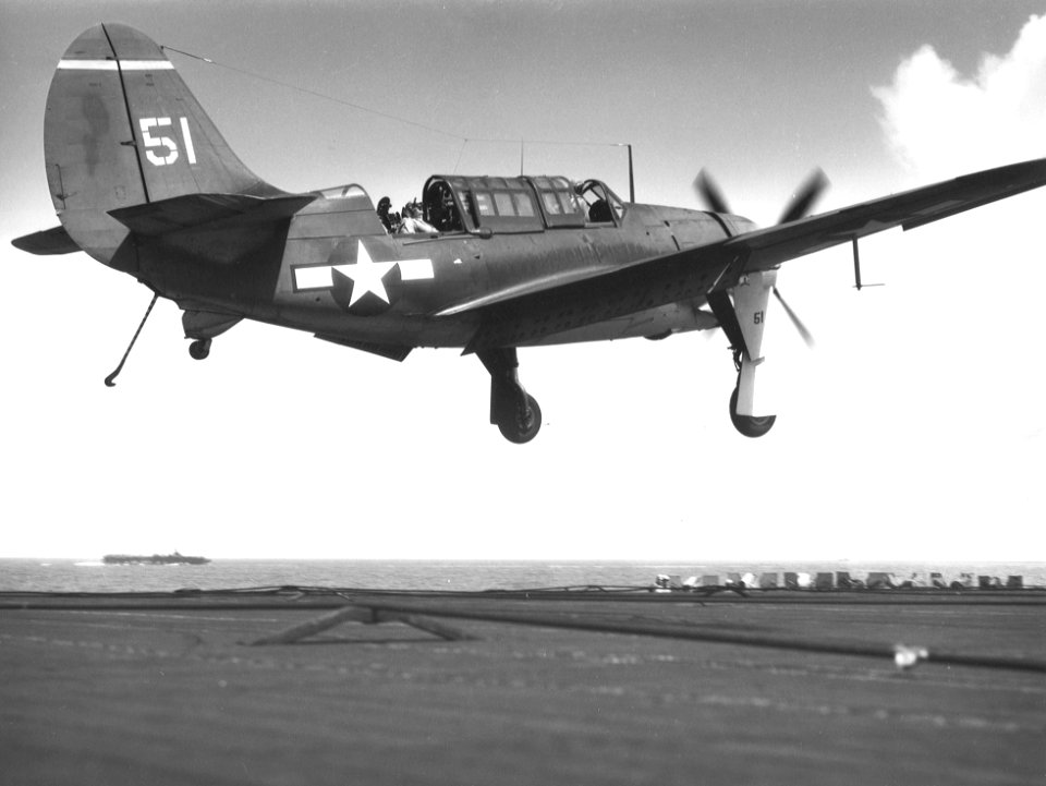 SB2C-1C of VB-15 landing on USS Essex (CV-9) 1944