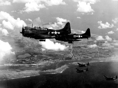 SBDs and TBFs from CVG-10 in flight 1944