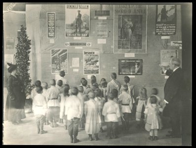 School children viewing an exhibition of English World War I posters, possibly in Russia LCCN2016652130
