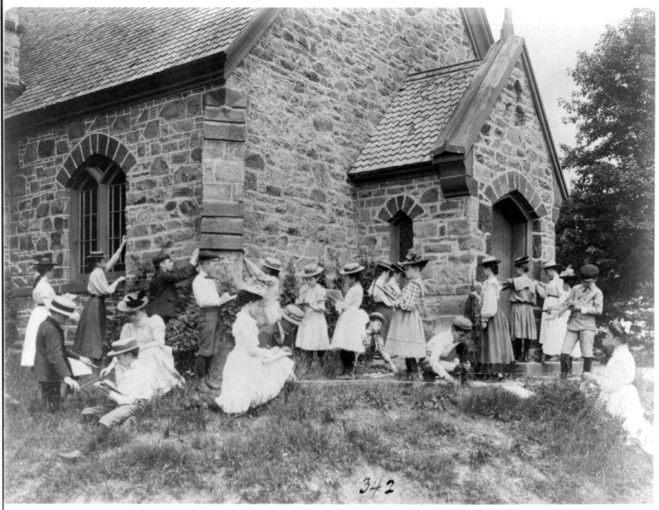 School children measuring and sketching at a stone building, Washington, D.C. LCCN2001699114