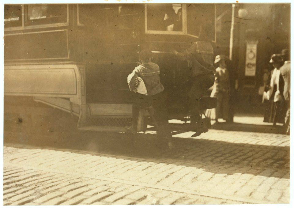 School boys, 'flipping cars,' noon. LOC nclc.04543