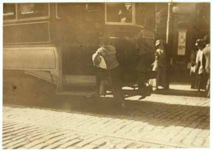 School boys, 'flipping cars,' noon. LOC nclc.04543