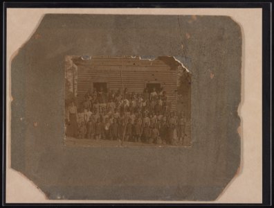 School children and teacher in front of schoolhouse, possibly in Pine Level, Alabama LCCN2015652136