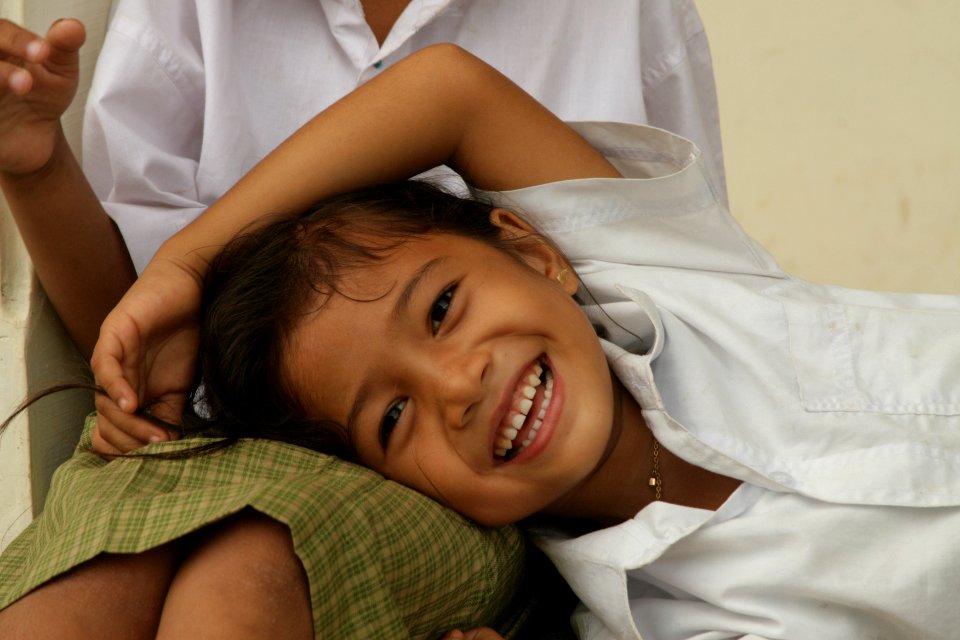 School children playing at a USAID funded school that is locate at a site along the Aceh West Coast Highway (5074347748)