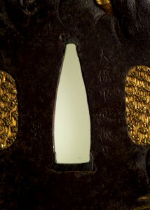 Sasayama Tokuoki - Tsuba with Dragon Ascending Through Clouds - Walters 51330 - Mark B