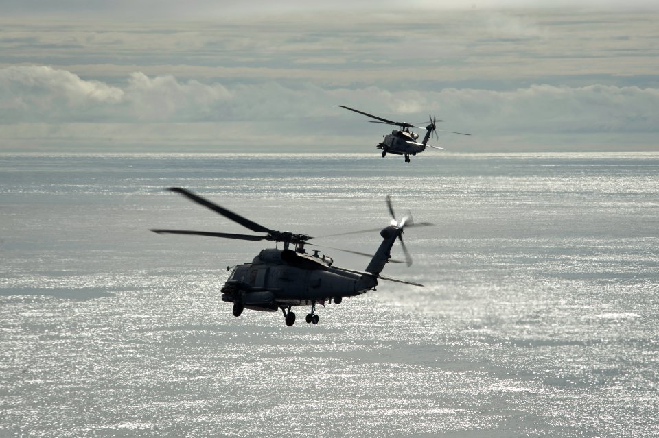 Sea Hawk helicopters maneuver over the South China Sea. (8782322671)