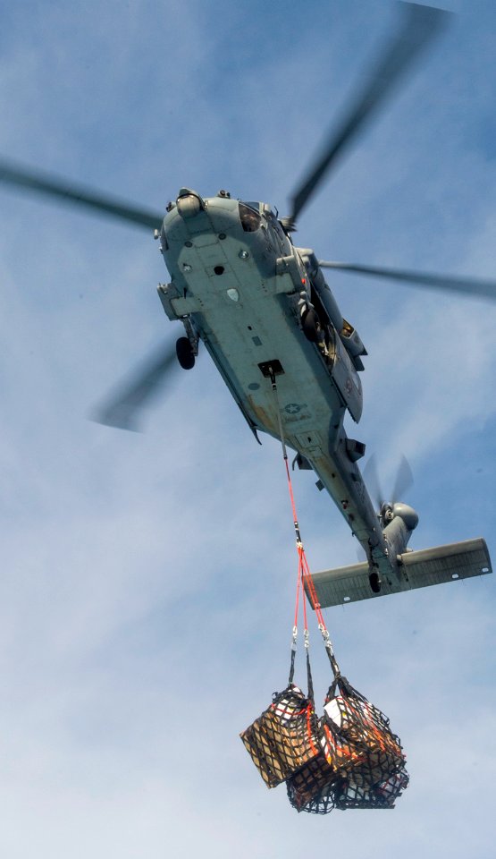 Seahawk distributes supplies to Carl Vinson Carrier Strike Group 140924-N-TP834-511