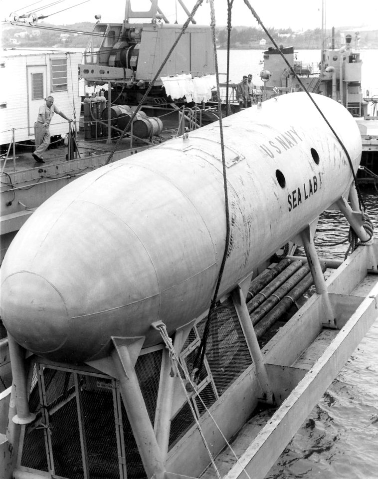 SEALAB I lowered into water
