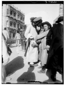 Searching Jewish rabbi for hidden arms, Jerusalem LOC matpc.00745