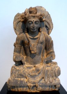 Seated Boddhisattva, Gandhara, c. 3rd-4th century AD, gray schist - Matsuoka Museum of Art - Tokyo, Japan - DSC07126 photo