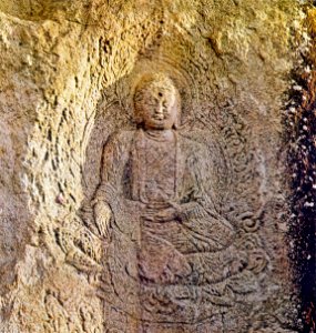 Seated Buddha Carved on the Rock at Donghwasa temple in Daegu, Korea