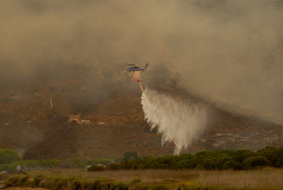 Sea Hawk helicopters douse hot spots. (8718542638)