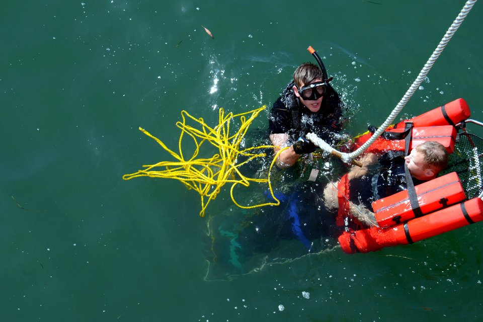 Search and rescue swimmer exercise 140521-N-BB534-163