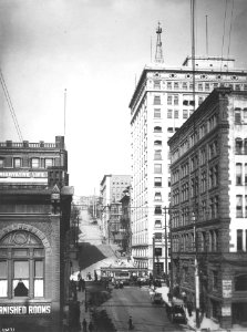 Seattle, looking east on Cherry St from 1st Ave showing the Alaska Building, Pioneer Square District, Seattle, ca 1909 (WARNER 630) photo