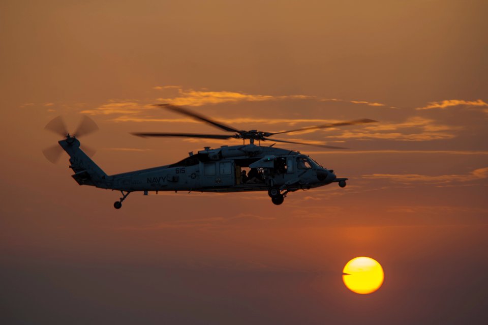 Seahawk flies near USS Carl Vinson 141028-N-TP834-657