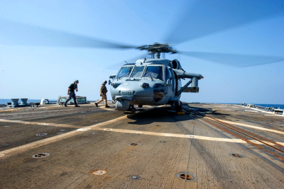 Seahawk prepares to take off from USS Truxtun 140930-N-EI510-115