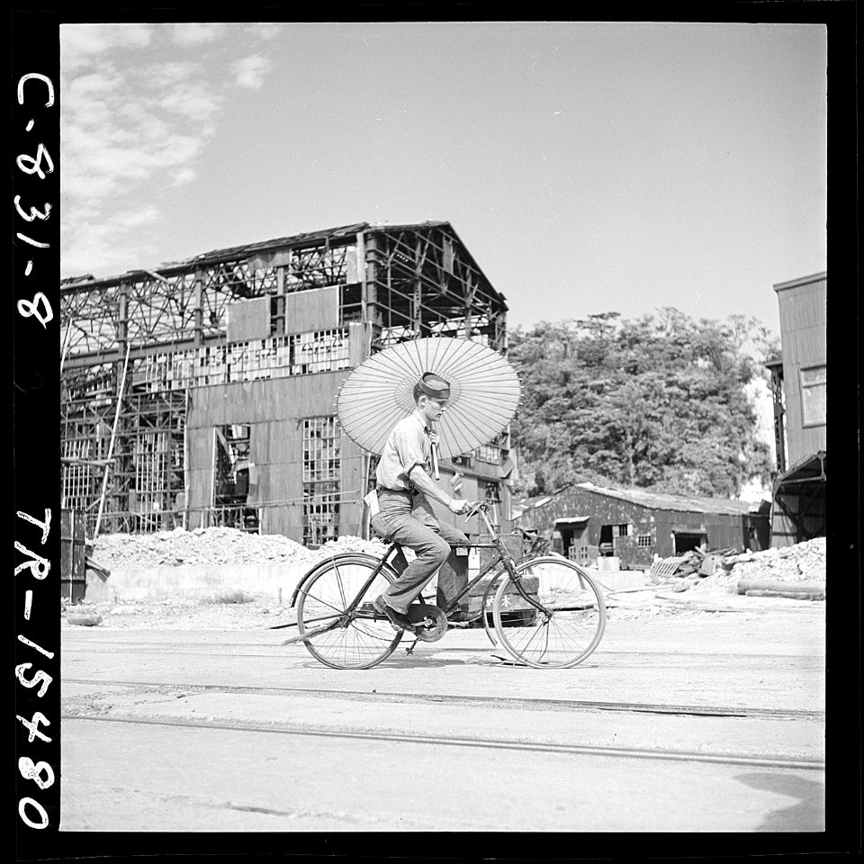 Seaman Paul Gray of San Dimos, Calif., rides Japanese bicycle in Tokyo, Japan. - NARA - 520930