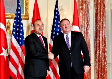 Sec Pompeo shakes hands with Mevlut Cavusoglu