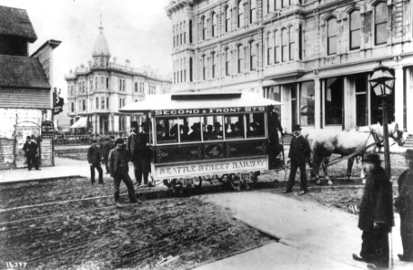 Seattle Street Railway, the first streetcar in Seattle, at Occidental Ave and Yesler Way with Mayor John Leary and city (CURTIS 2035) photo