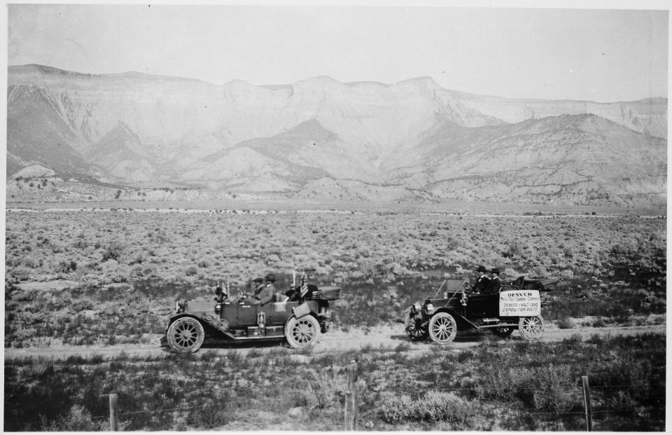 An AAA Good Roads Official on his transcontinental auto trip passes the only road sign in evidence along the dusty, deso - NARA - 513357