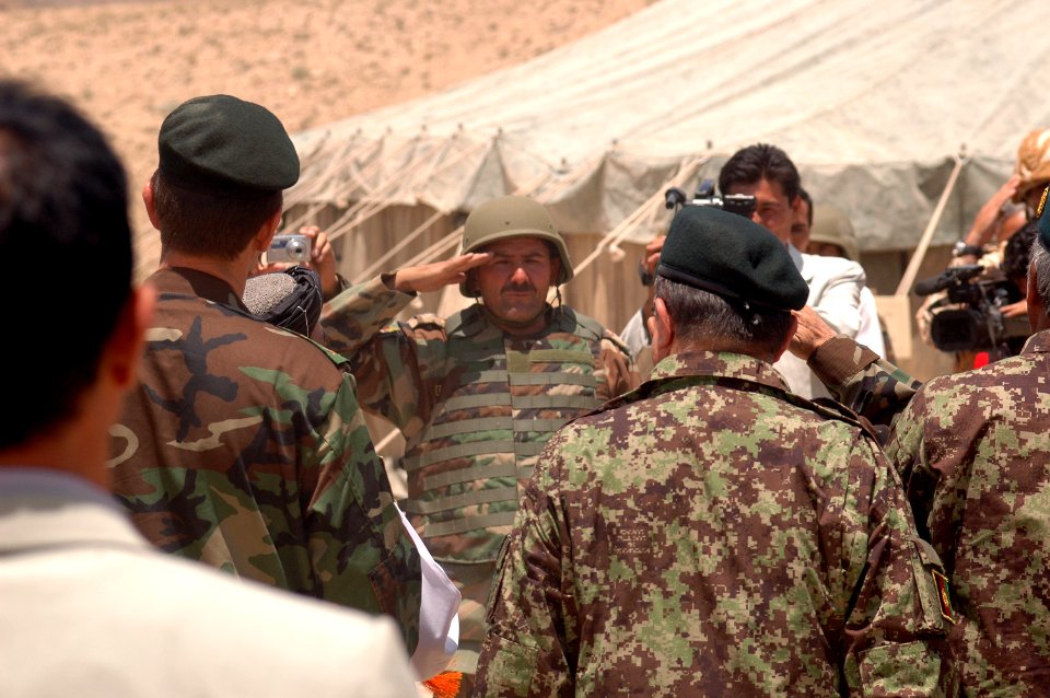 An Afghan National Army soldier greets Members of Parliament, various Province Representatives and Consolidated Fielding Center leadership (4763808740)