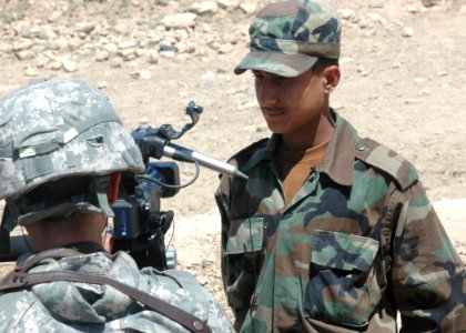 An Afghan National Army trainee is interviewed by Technical Sergeant Michael Tateishi (4705413479)