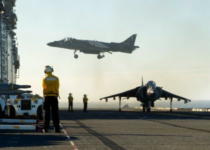 An AV-8B Harrier II lands on the flight deck of USS Boxer. (21246022684)