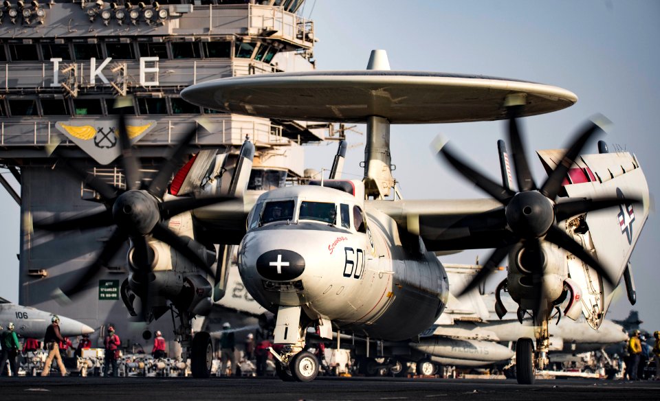An E-2C Hawkeye taxis across the flight deck of USS Dwight D. Eisenhower. (28789073682)