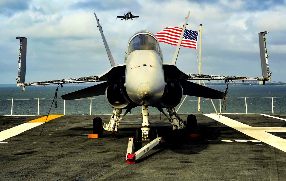 An EA-18G Growler approaches USS Dwight D. Eisenhower for a fly over. (21694060261)