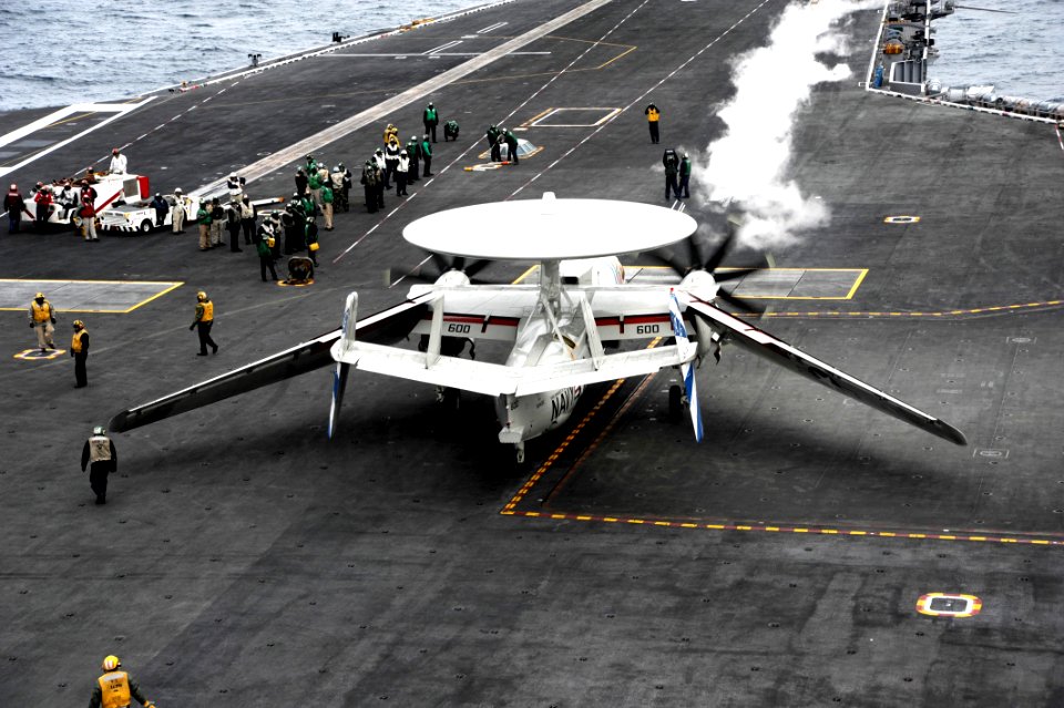 An E-2C unfolds its wings aboard USS Dwight D. Eisenhower. (8510385126)