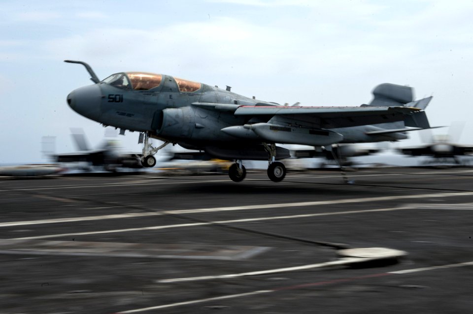 An EA-6B performs an arrested recovery at sea. (8580533156)