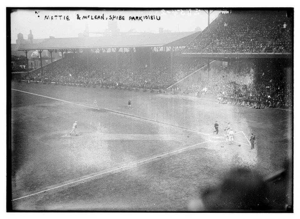 Christy Mathewson (New York Giants) pitches as Larry McLean (New York Giants) catches in Game Two of the 1913 World Series at Shibe Park Philadelphia (baseball) LCCN2014694440