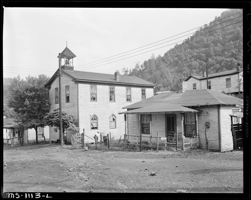 Church (left) and one of homes for miners. Mullens Smokeless Coal Company, Mullens Mine, Harmco, Wyoming County, West... - NARA - 540672